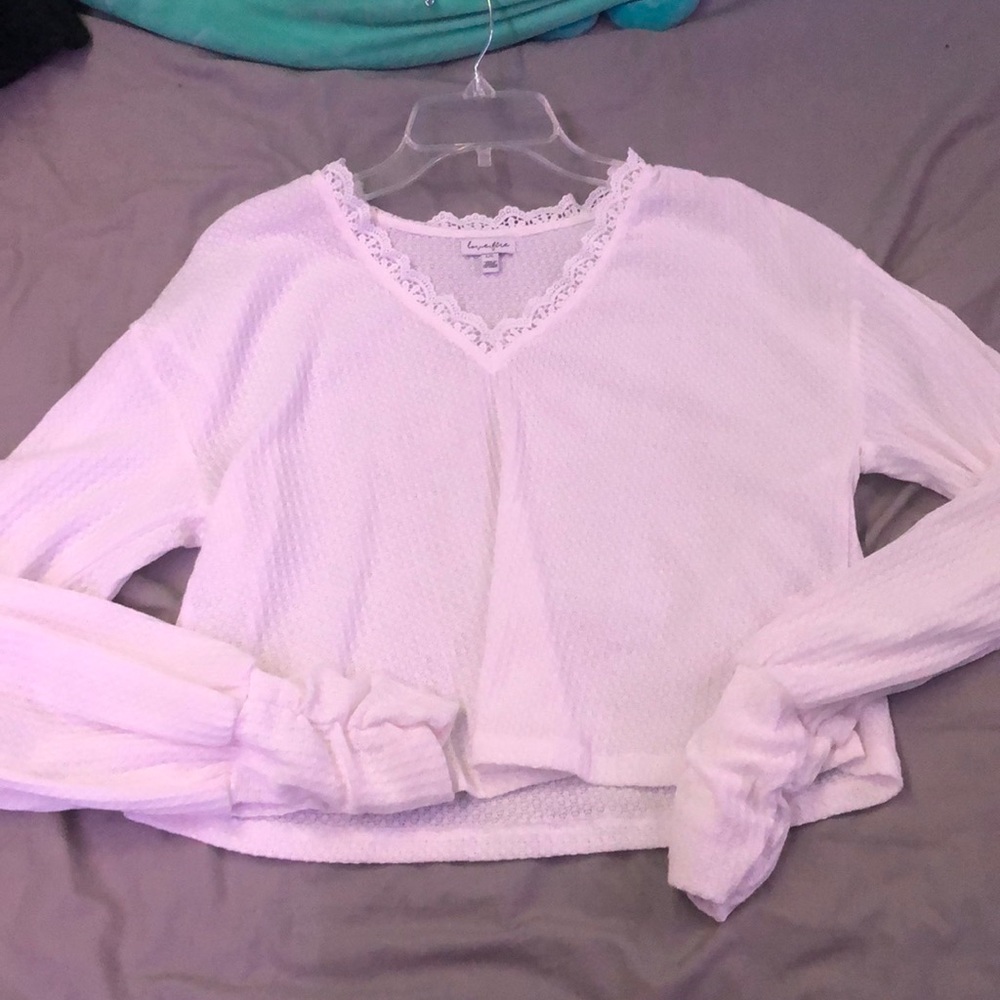 Thin material-white long sleeve, beautiful neckline and poofy sleeves
